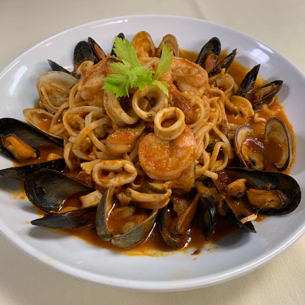 Luciano's Ristorante & Lounge's linguine pasta with mussels, clams, shrimp, and calamari in red sauce.